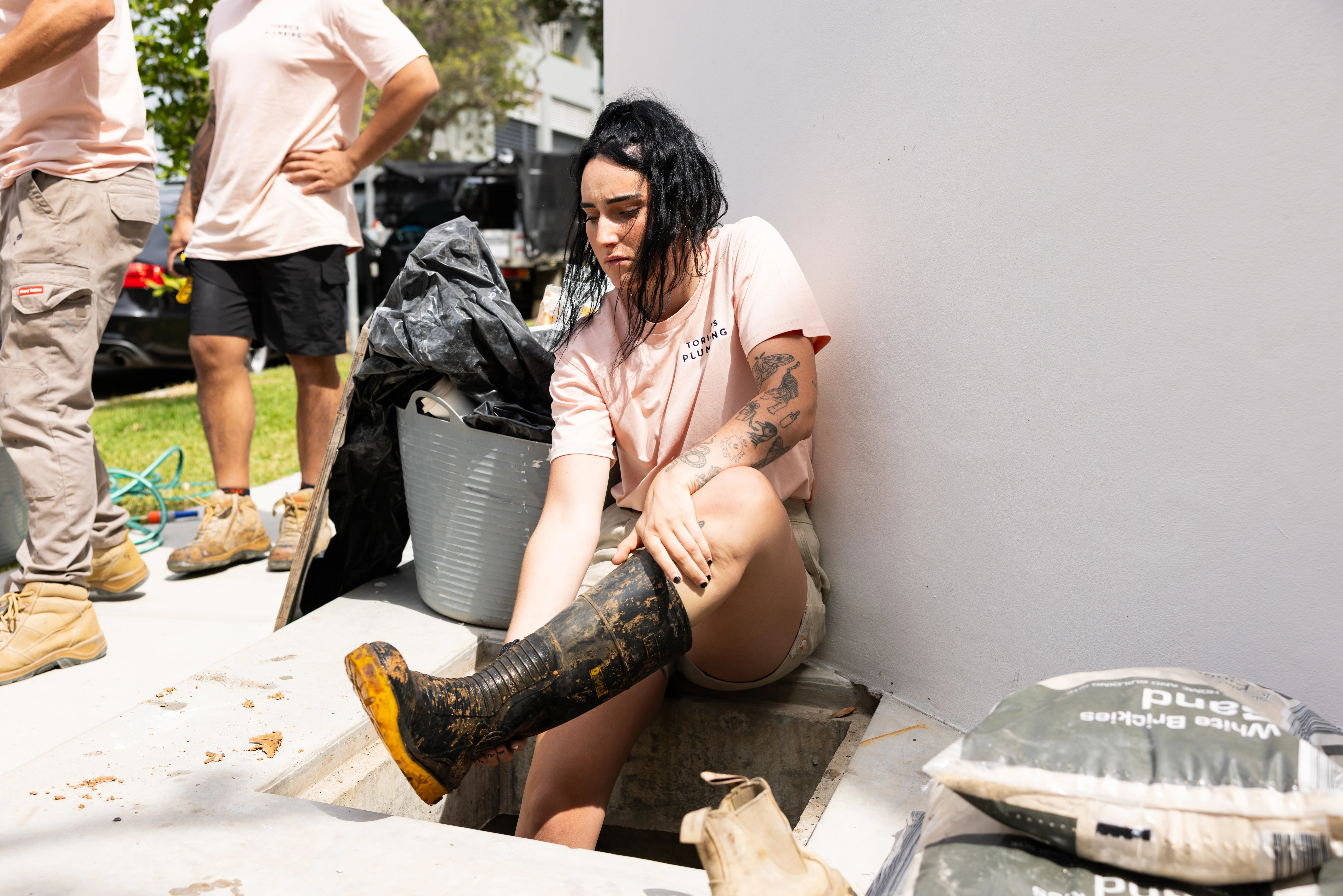 Plumber clearing a blocked drain in Maroubra