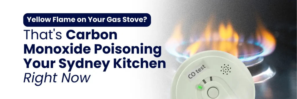 A gas stove with a yellow flame next to a carbon monoxide detector, highlighting safety warnings about carbon monoxide in kitchens.
